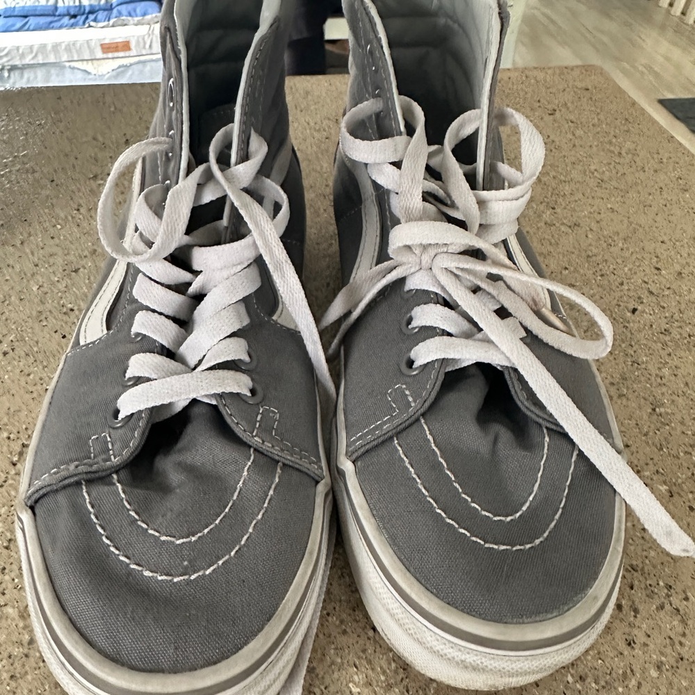 Vans White and Black High-Top Sneakers